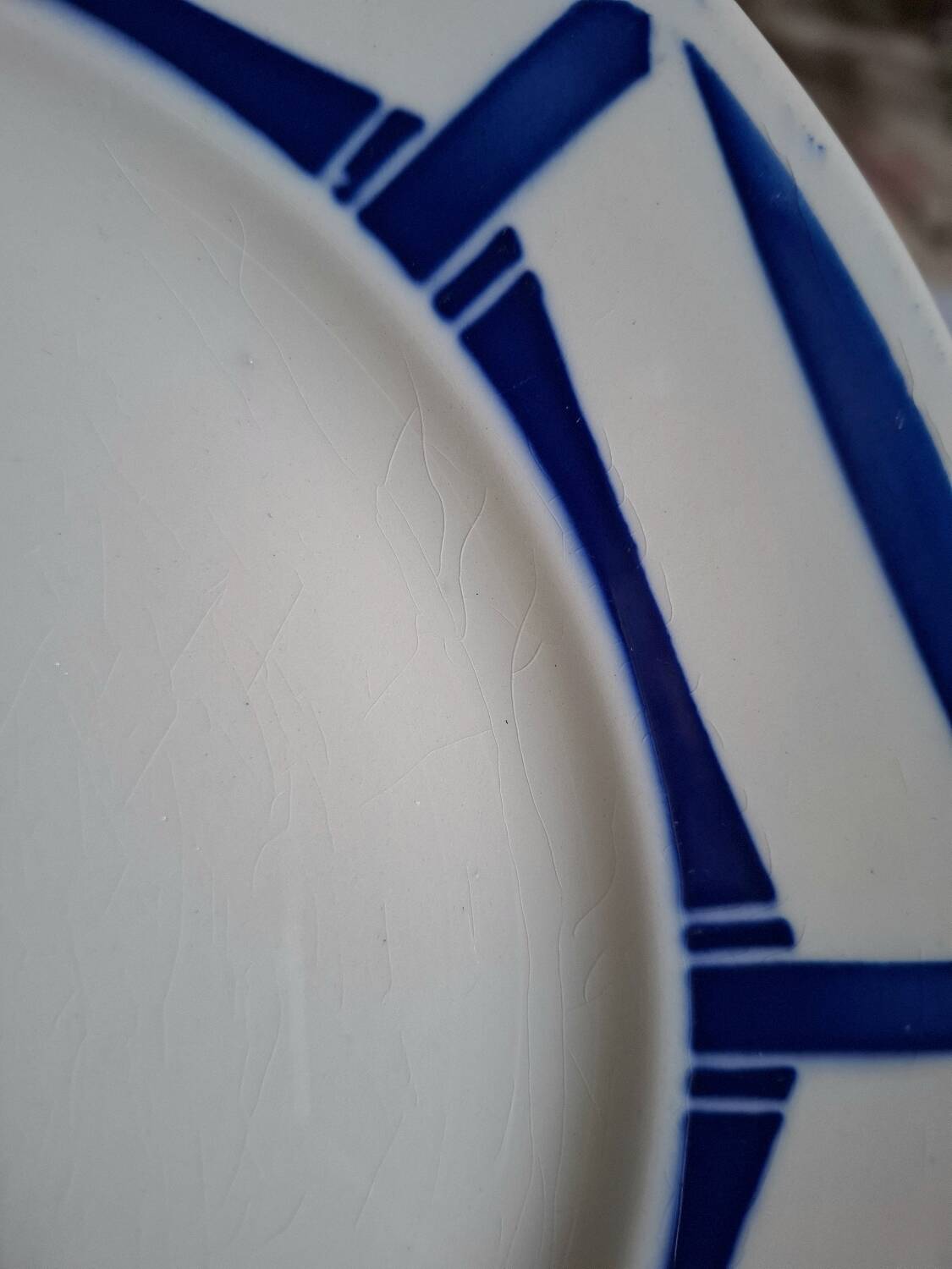 Mismatched antique flat plates in earthenware