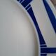 Mismatched antique flat plates in earthenware