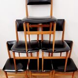 Six vintage wooden chairs and black Skaï