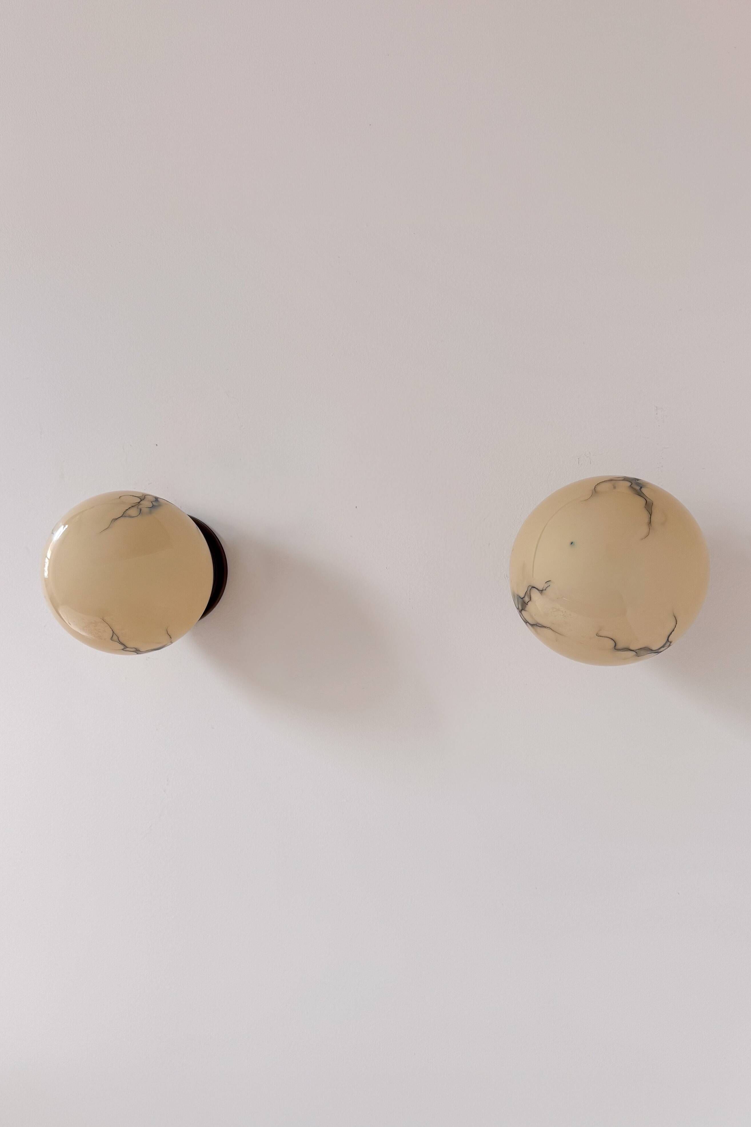 Pair of vintage wall lights, brass and "marbled" opaline, France, 1940.
