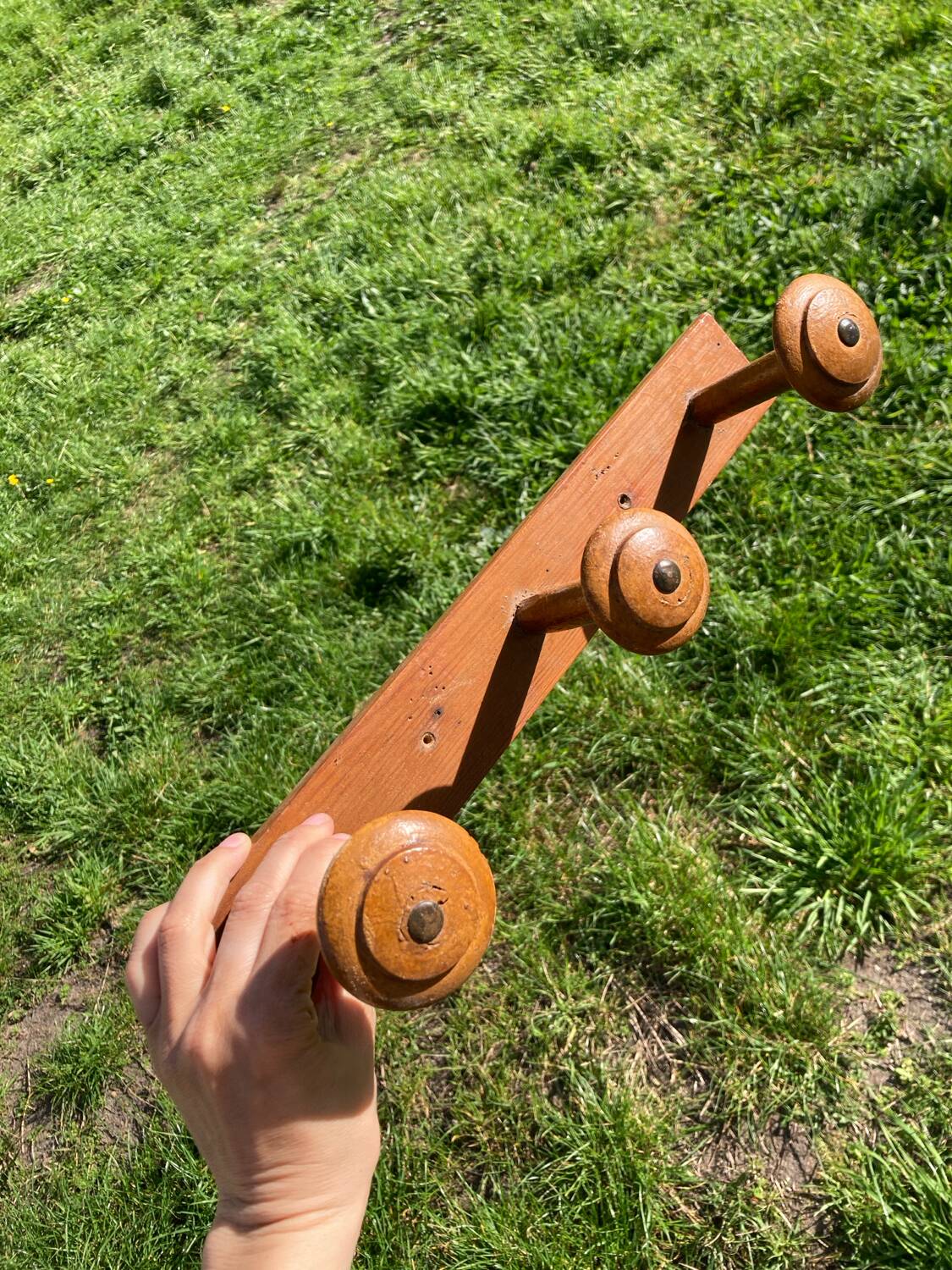 Old wooden wall coat rack