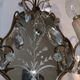 Pair of mirror sconces with two arms of light with gilded brass grapevines, Italy 1960.