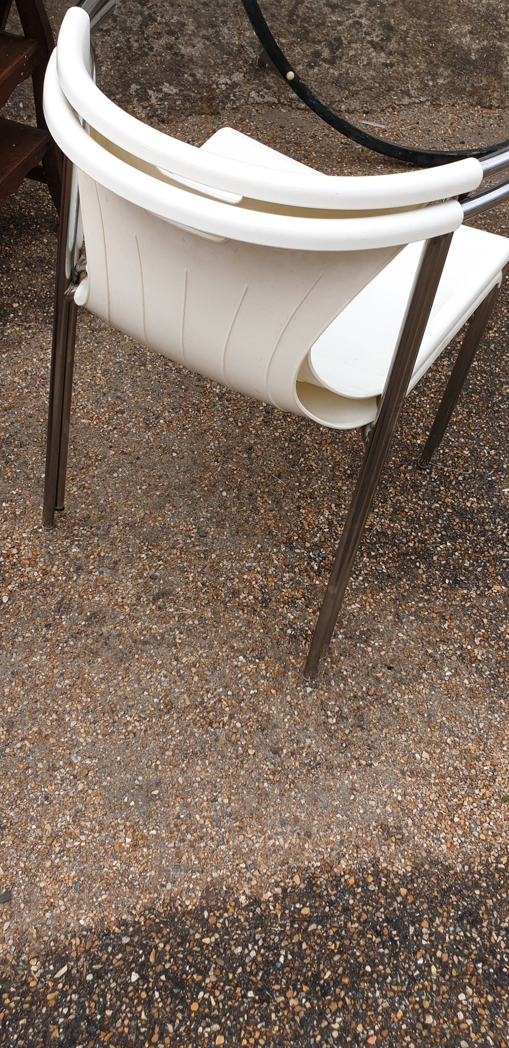 Pair of chrome and resin design armchairs