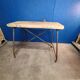 Vintage workbench circa 1930, folding metal leg.