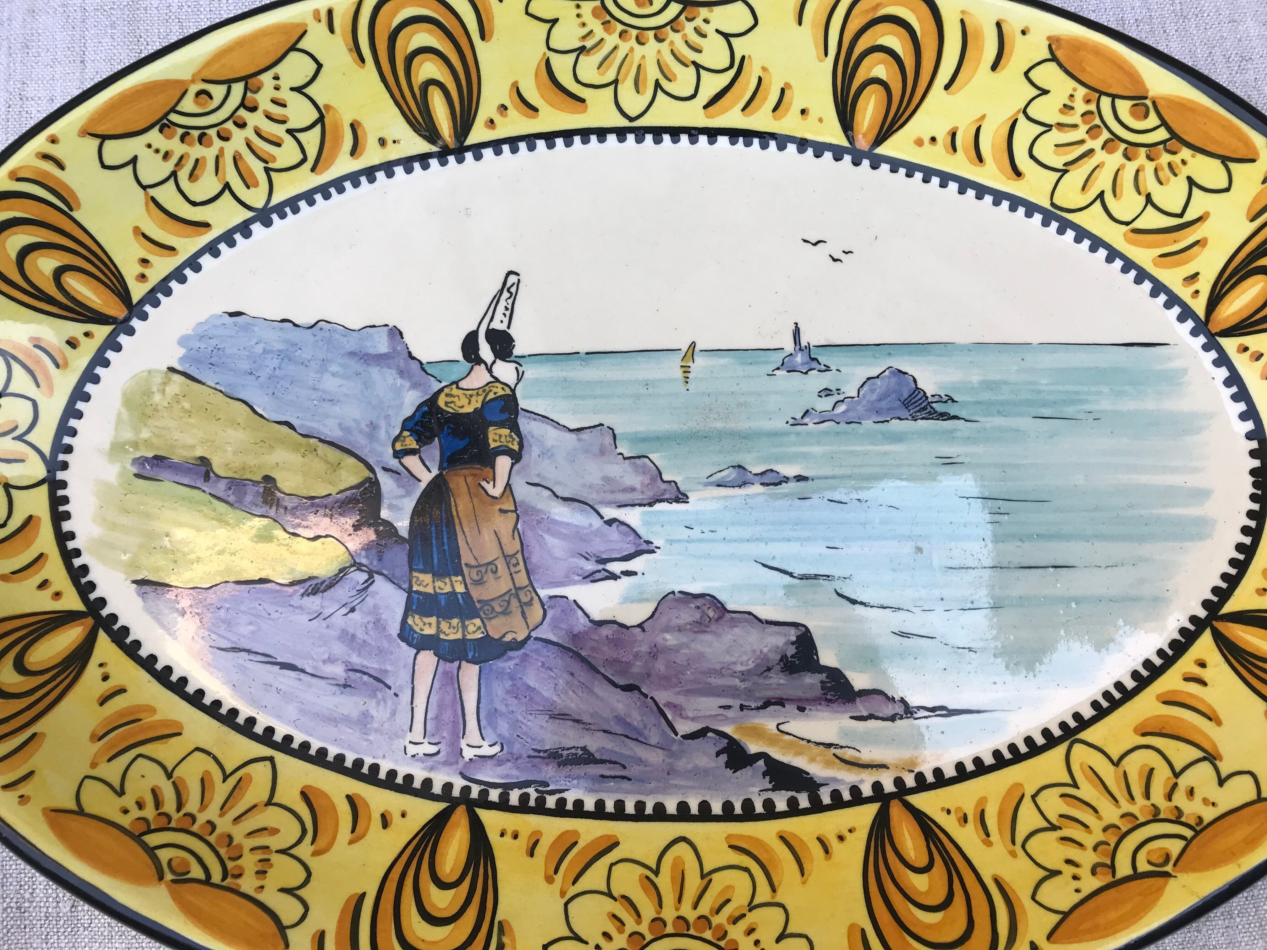 Old faience dish, Scéne Bretonne after Louis Suire and Masse Frères