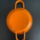 Orange enameled sheet egg dish
