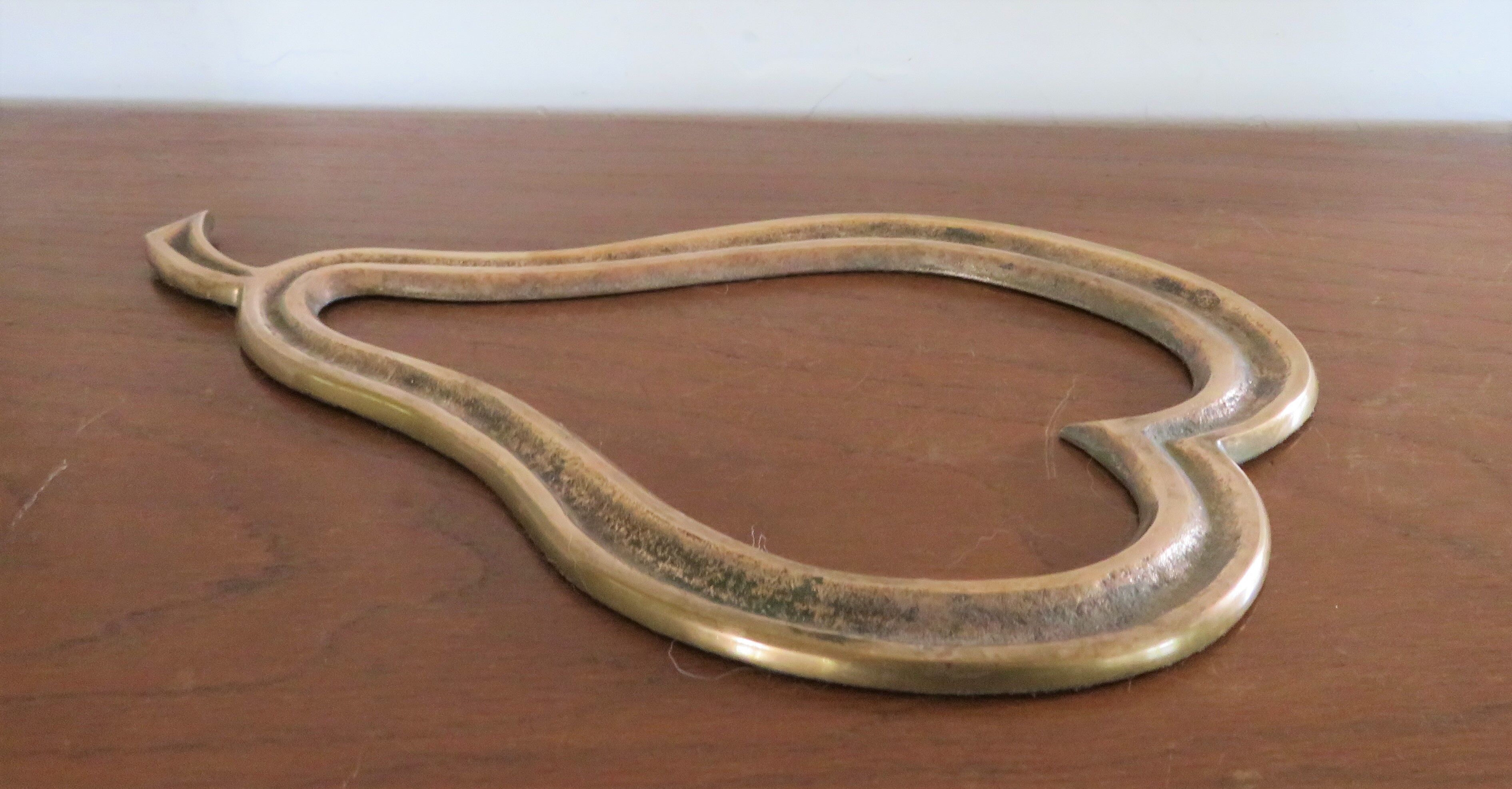 Brass pear mat