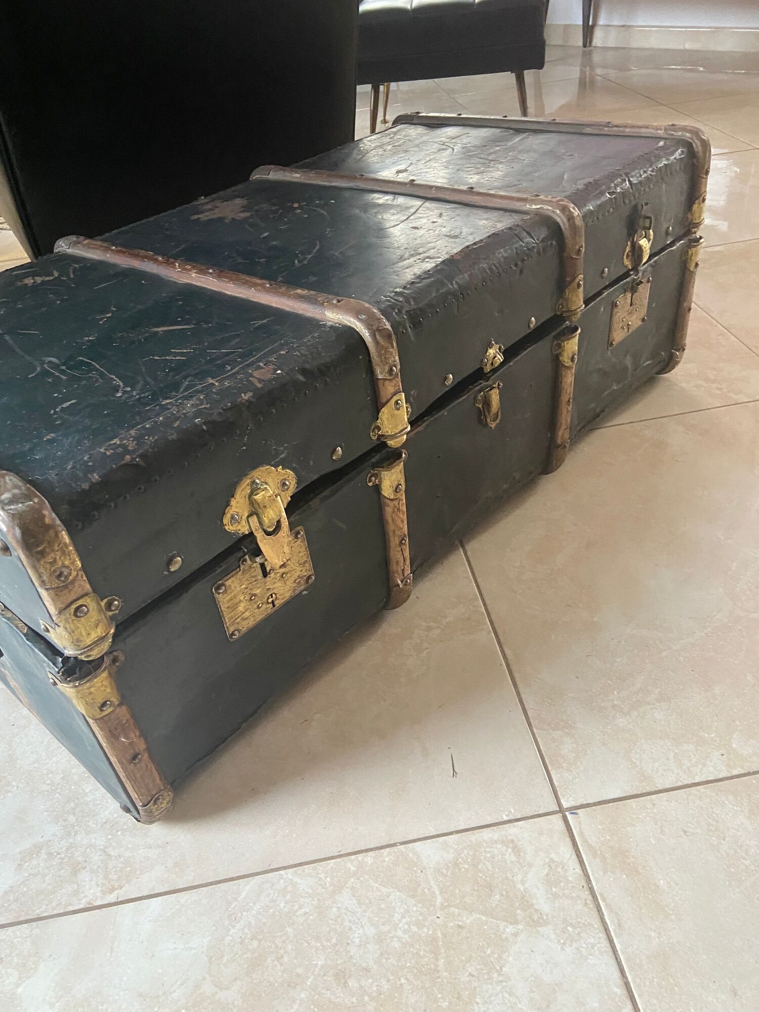 Old trunk in zinc/wood and brass