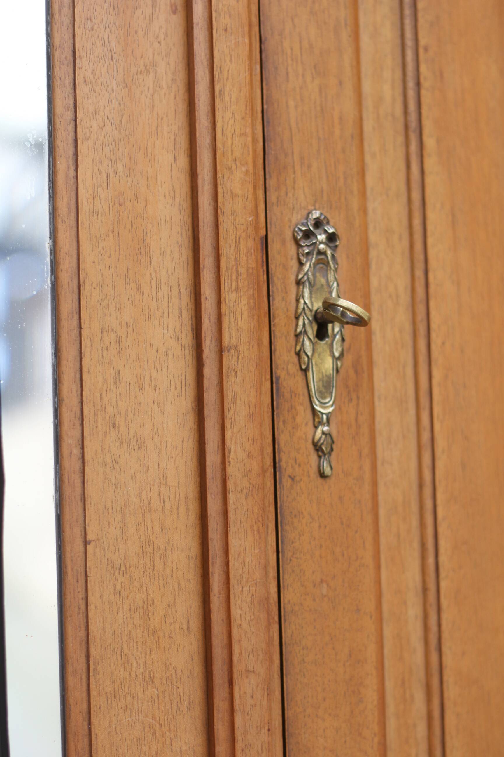 Majestic solid walnut wardrobe. Stamped work, late 19th century.
