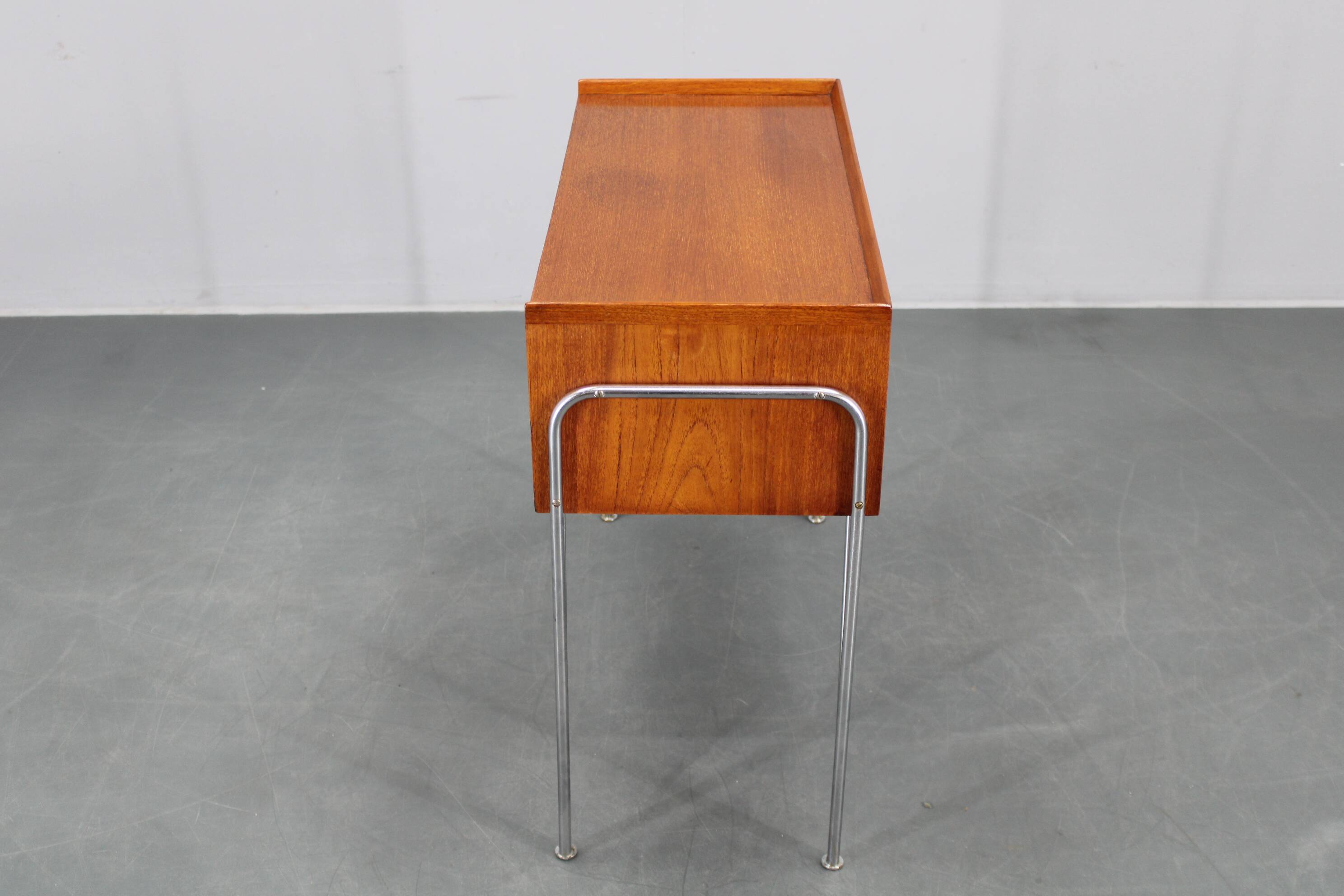 1960s Danish teak shelf cabinet with chrome plated legs
