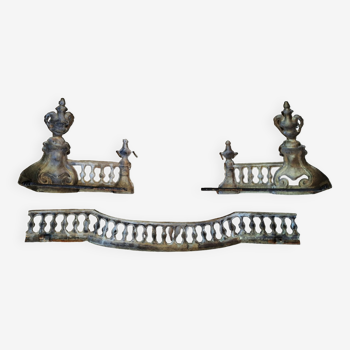 Louis XVI style bronze andirons and fireplace bar