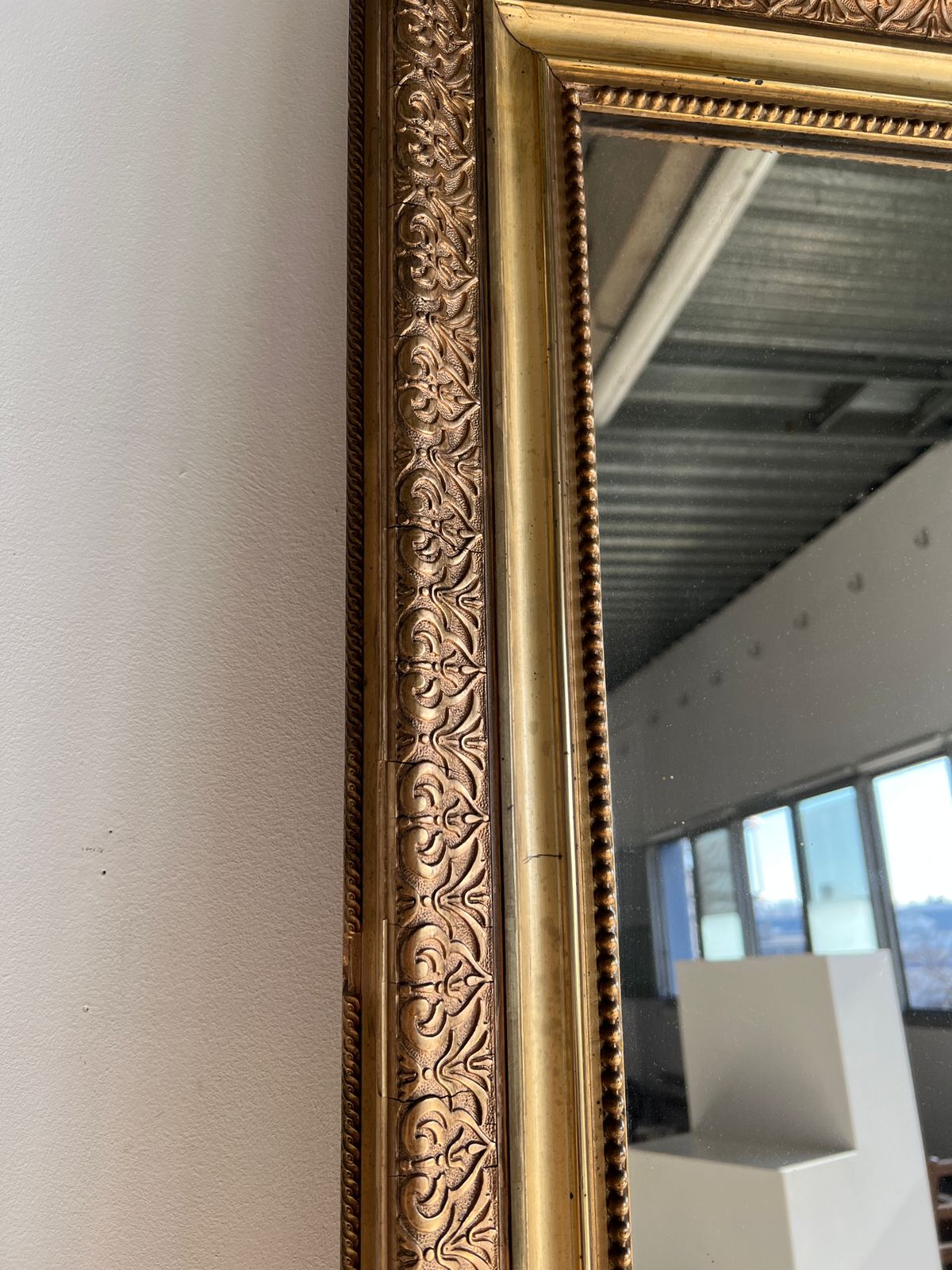 Gilded mirror with frieze h2m10 l:73cm