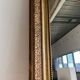 Gilded mirror with frieze h2m10 l:73cm