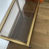 Coffee end table in smoked glass and brass