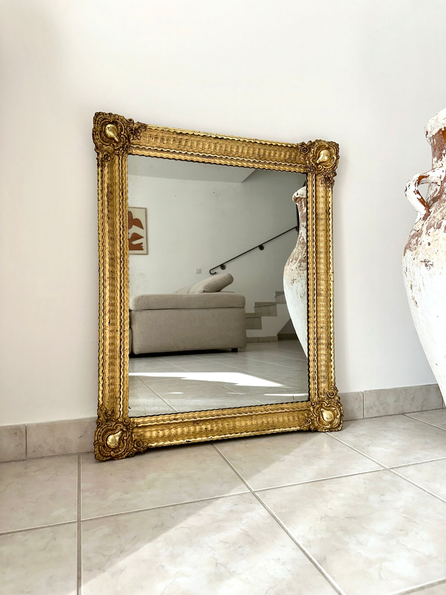 Mirror from the Restoration period, antique gilded, 19th century.