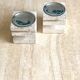 Pair of travertine candlesticks by Fratelli Mannelli, 1970