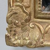 Miroir en bois doré, style régence, fin XlXe