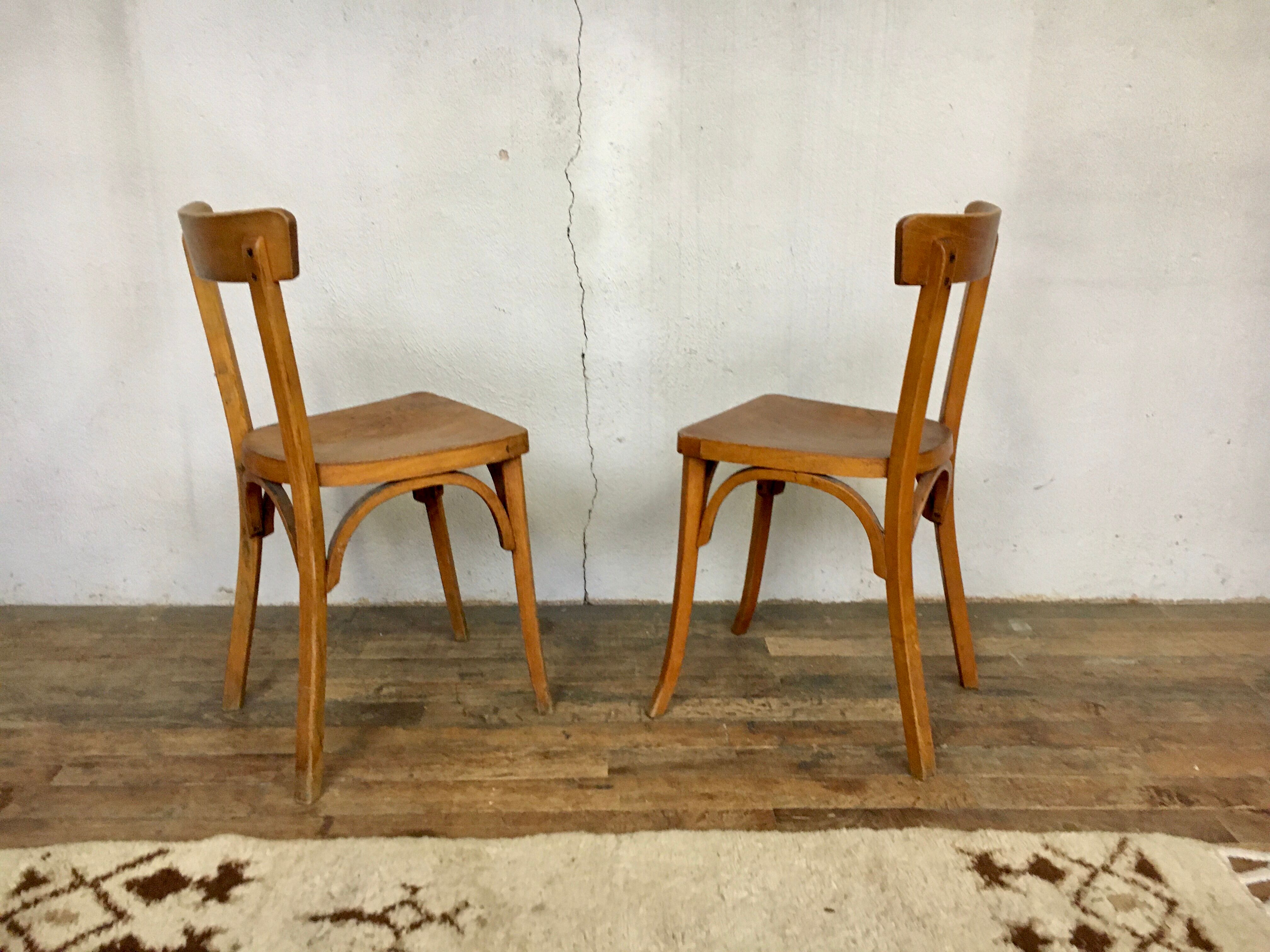 Pair of vintage clear beech baumann chair