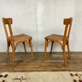 Pair of vintage clear beech baumann chair