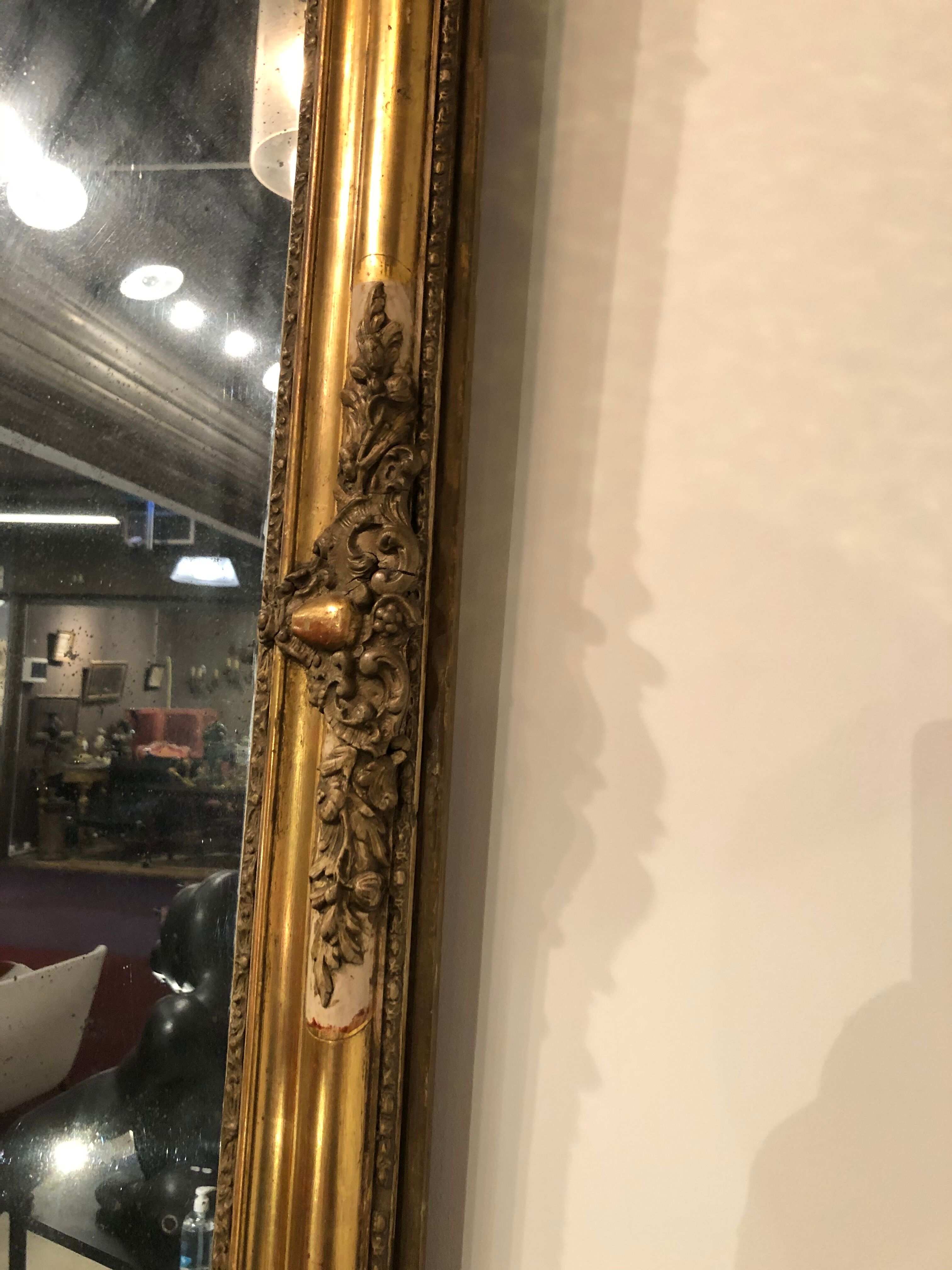Miroir d'époque Restauration en bois stucké doré - 125x78cm