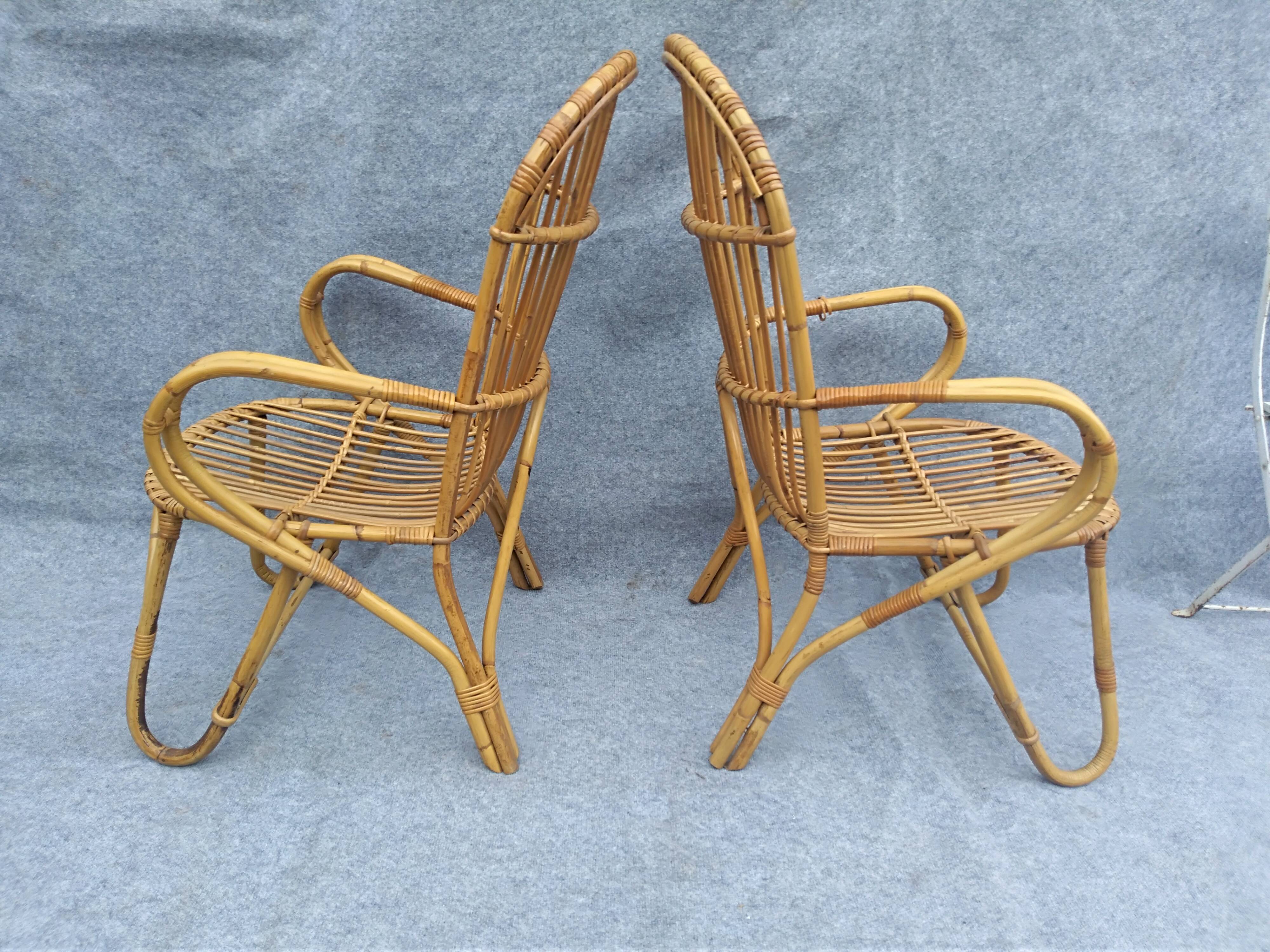 Pair of high-backed rattan armchairs