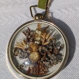 Domed frame of dried flowers