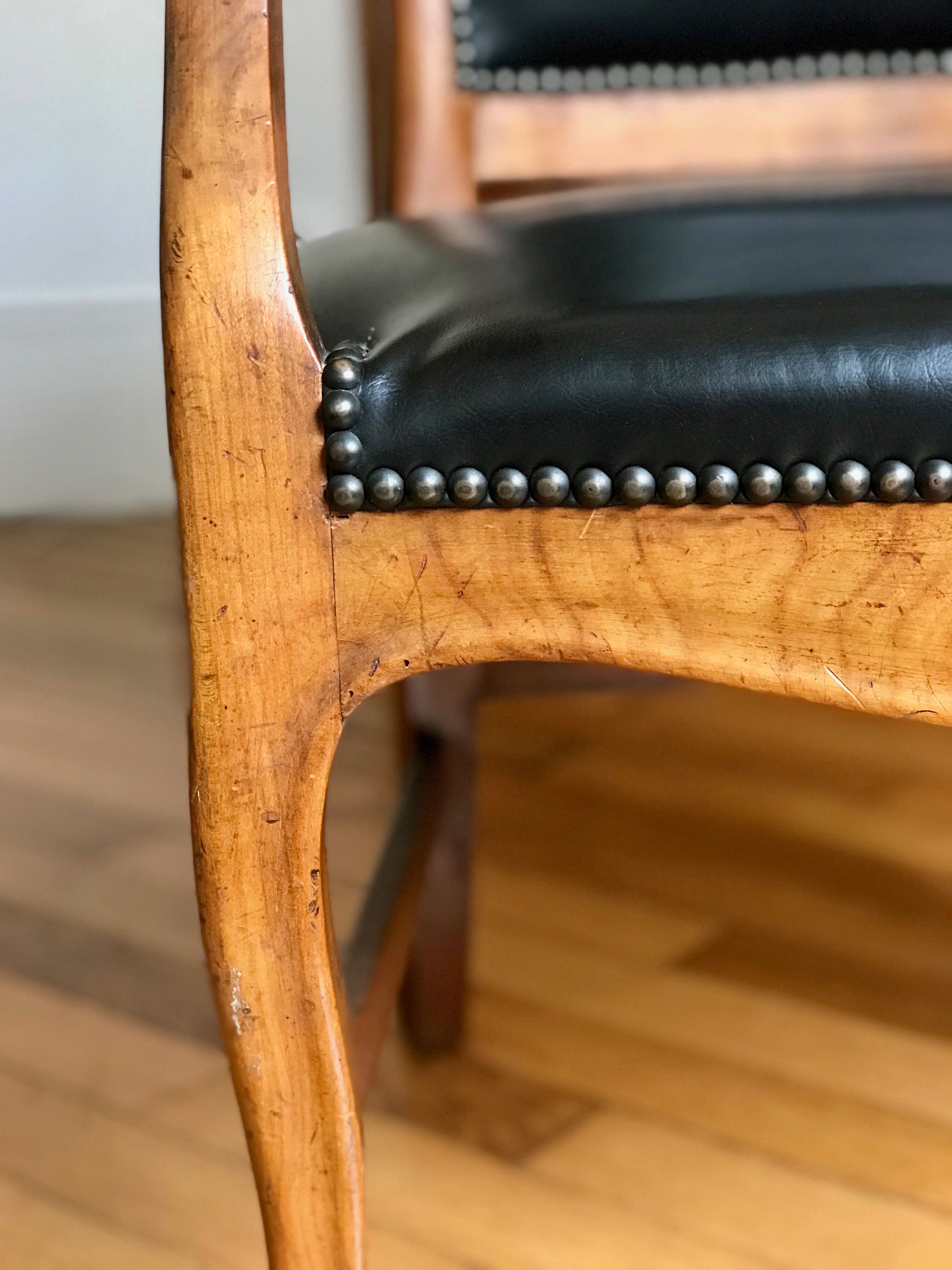 Wood and leather armchair