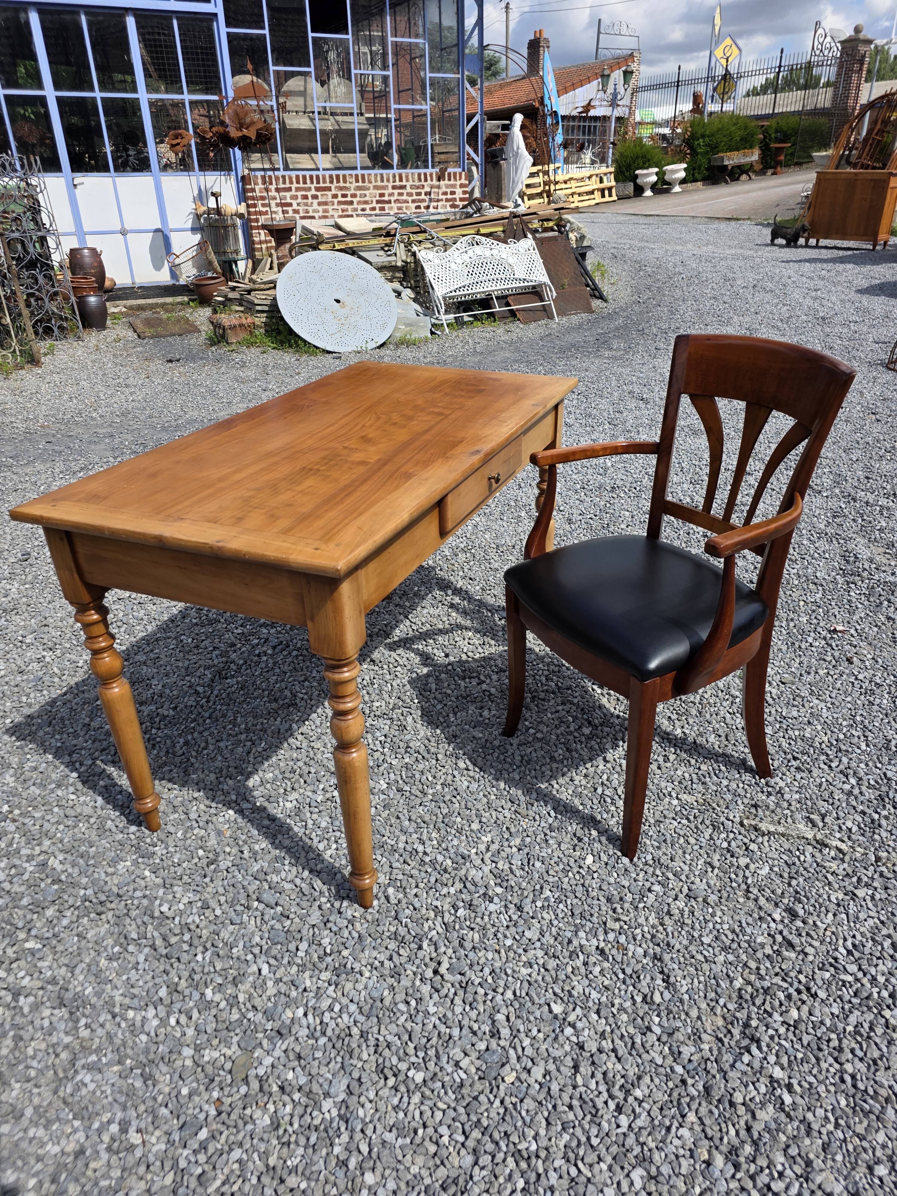 Mid-20th century solid cherry wood office chair.