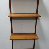 Vintage teak wall system by Poul Cadovious