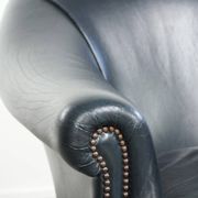 Set of dark blue cow leather club armchairs with a unique design