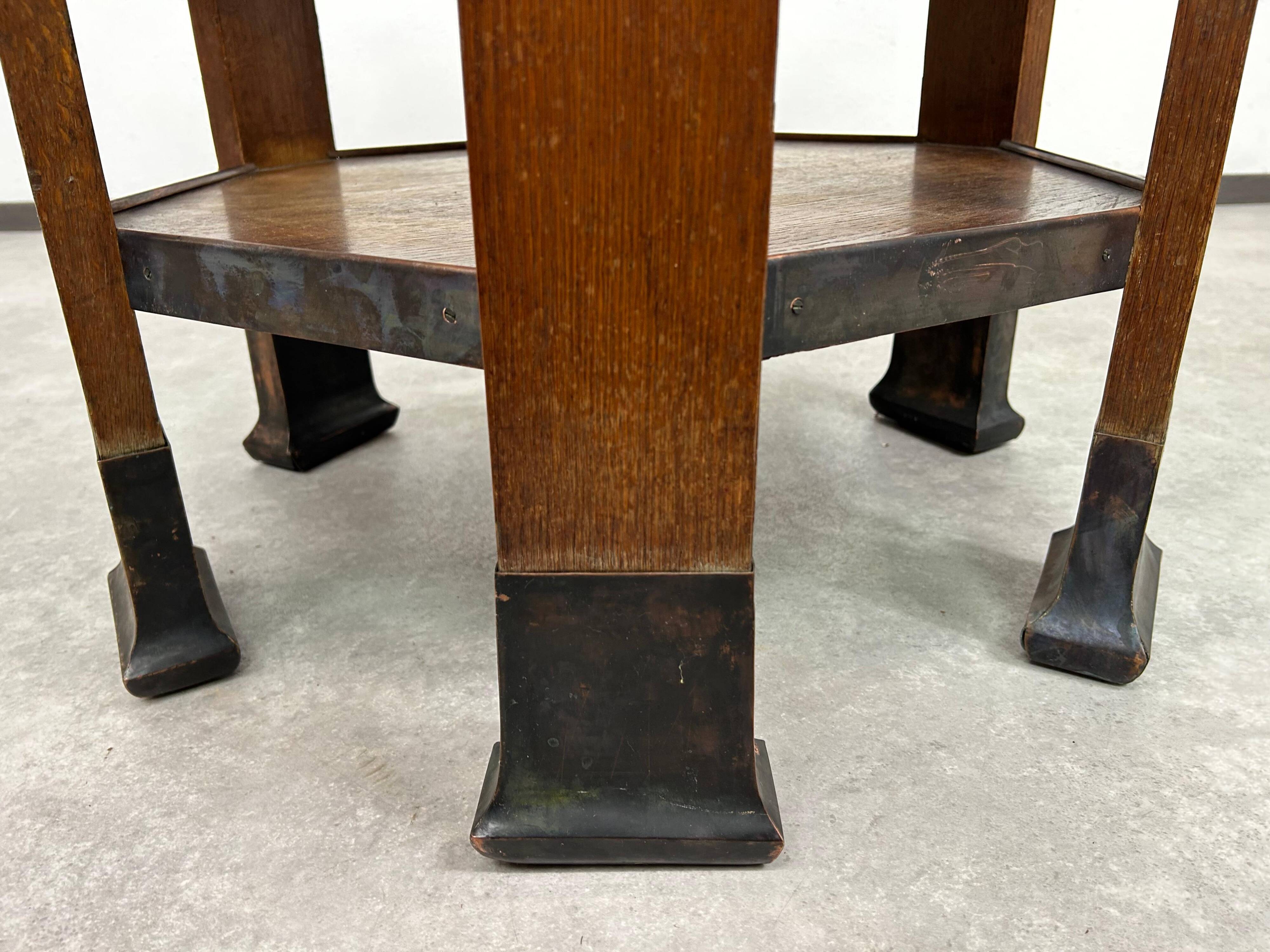 Hexagonal table with six legs in Secession style bordered with brass, attributed to Adolf Loos.