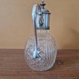 Cut crystal carafe and silver-plated metal
