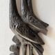 Brutalist wall sculpture with birds Ars Munda