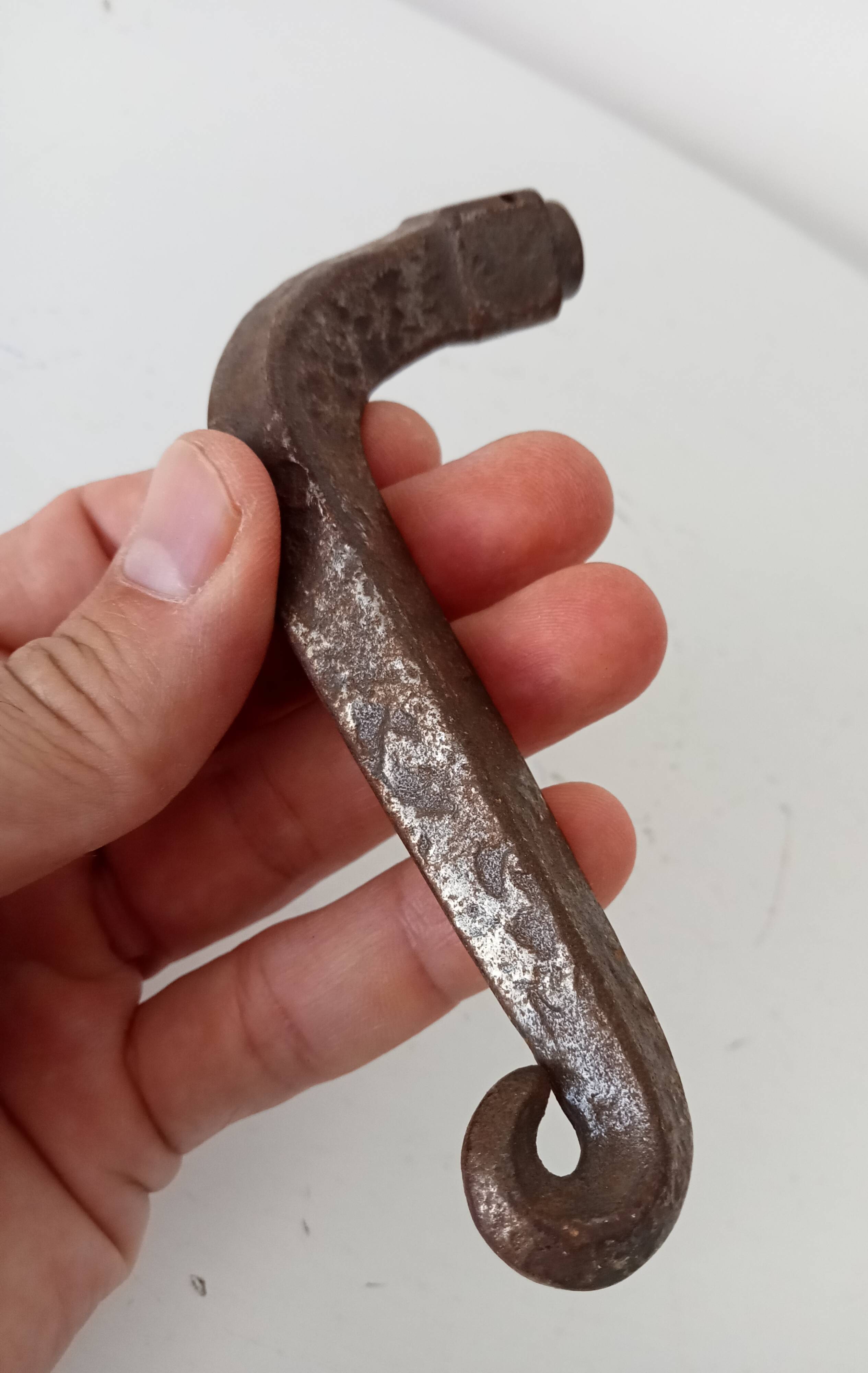 19th-century antique door handle in forged steel