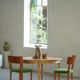 Round solid oak dining table with three extensions, mid-century Danish style, 1960s.