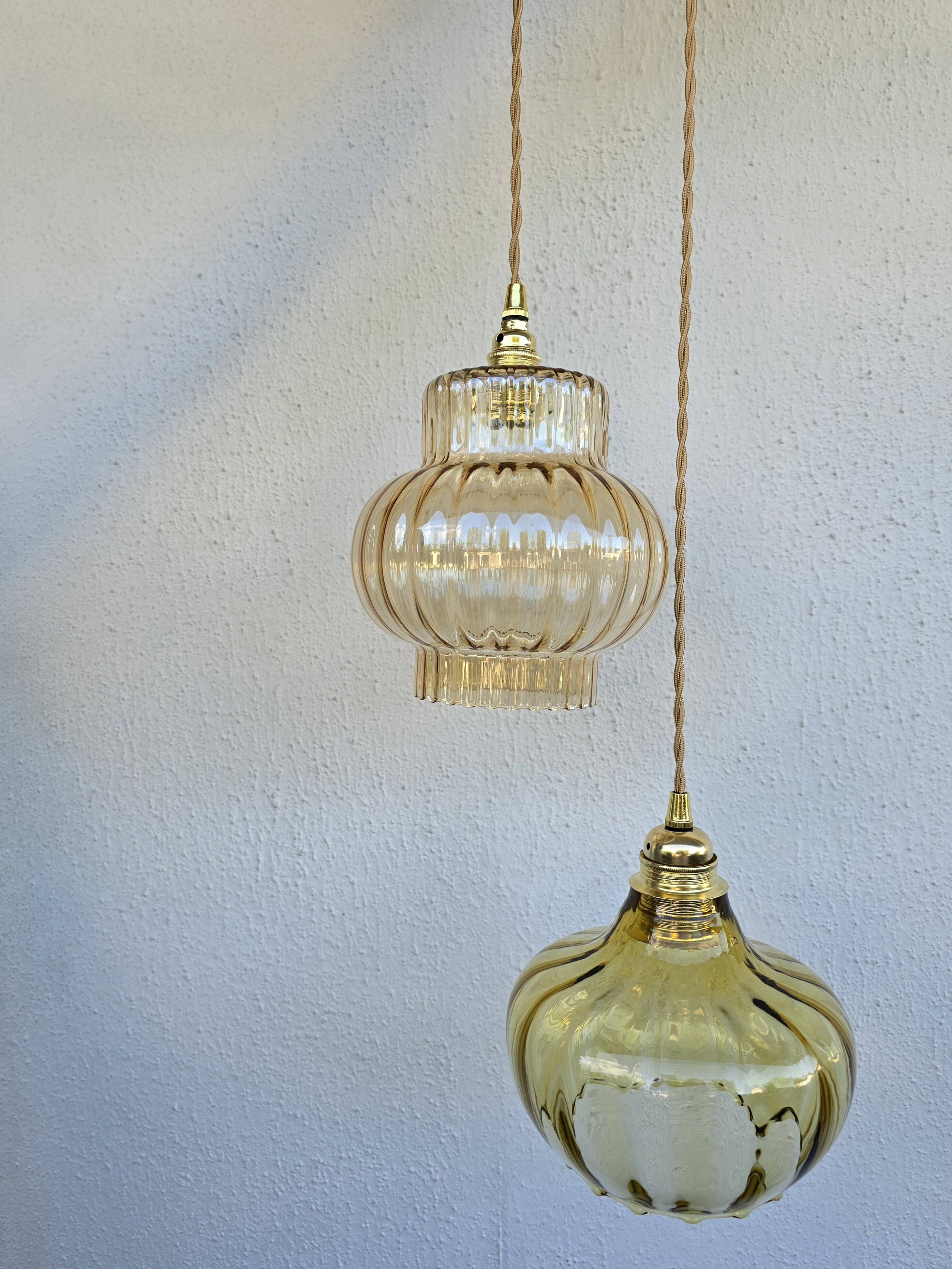 Vintage amber cascading suspension globes