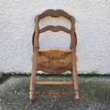 Provencal straw armchair in walnut