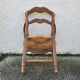 Provencal straw armchair in walnut
