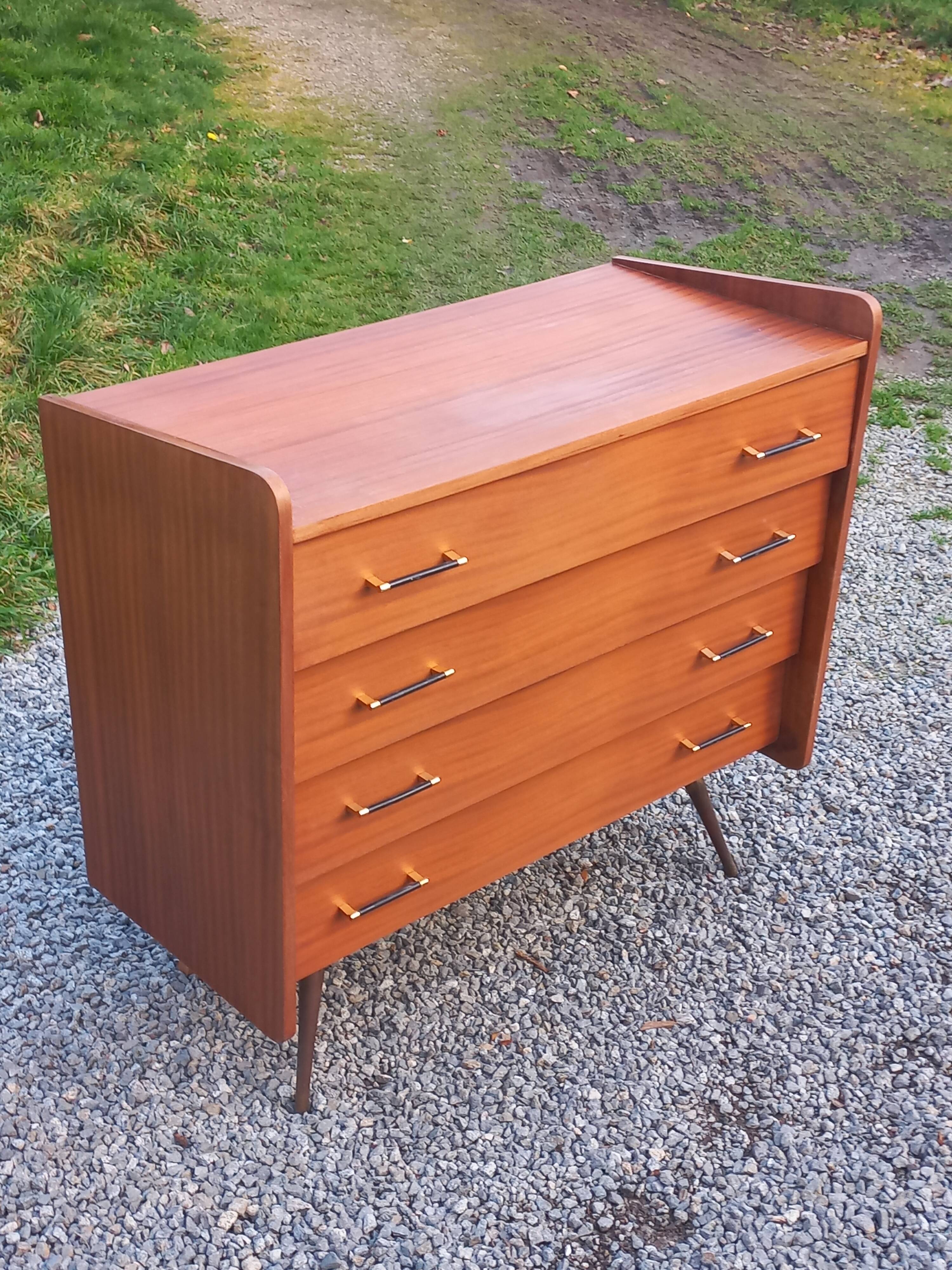 Vintage mahogany commode with metal tapered legs, 4 drawers, 1950s.