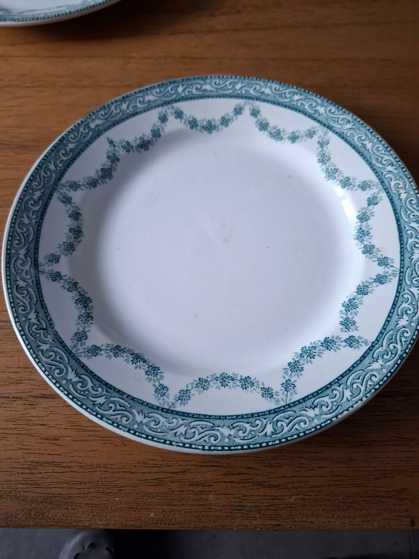 Set of 3 flat plates made of ironstone.