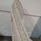 White wicker armchair