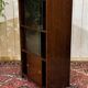 Small English oak library from the 1960s with sliding doors.