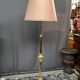 Baroque-style floor lamp in solid gilded bronze decorated with crystal pendants.