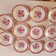 set of 11 vintage soup plates with red flowers