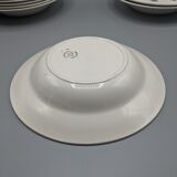 12 hollow porcelain plates, floral decoration and golden ledé - ∅: 23cm