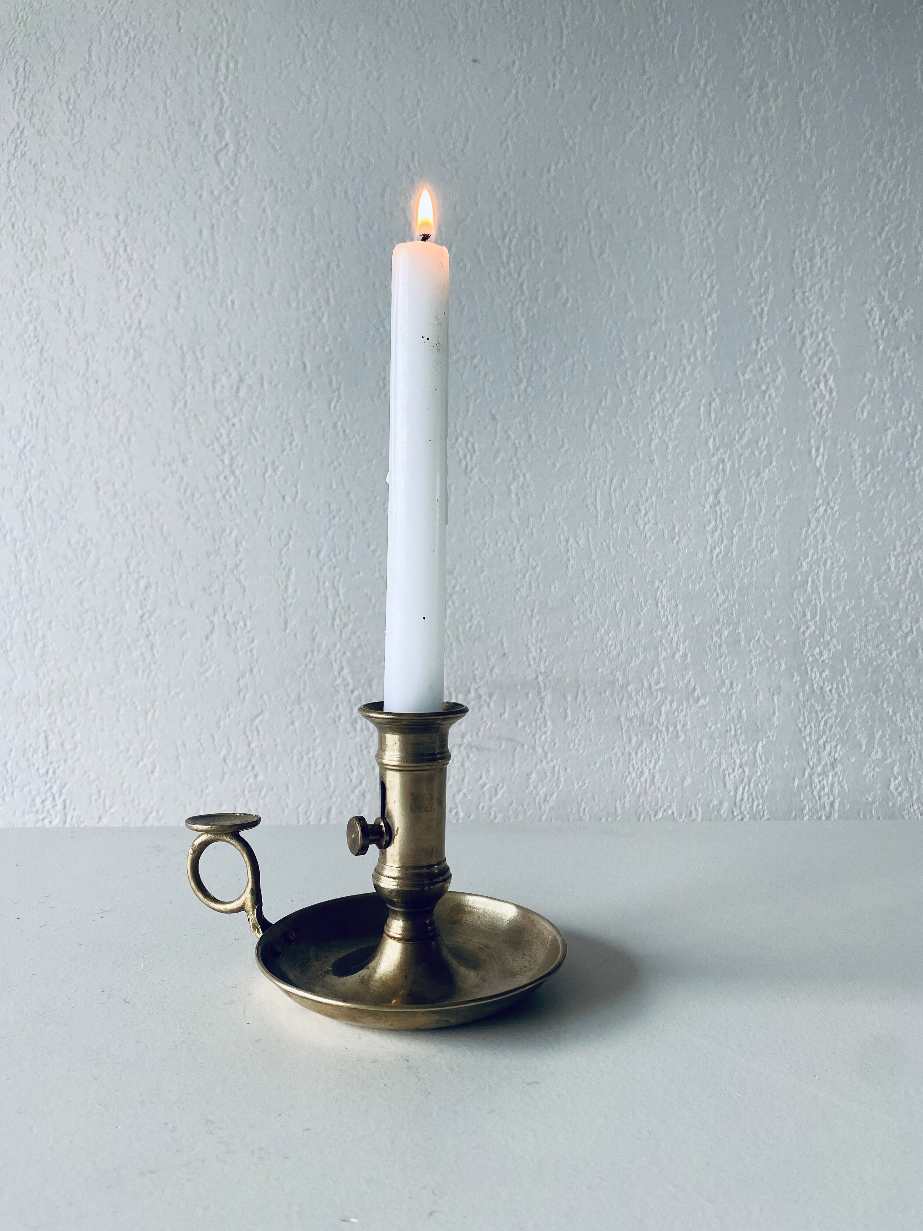Antique brass candle holder