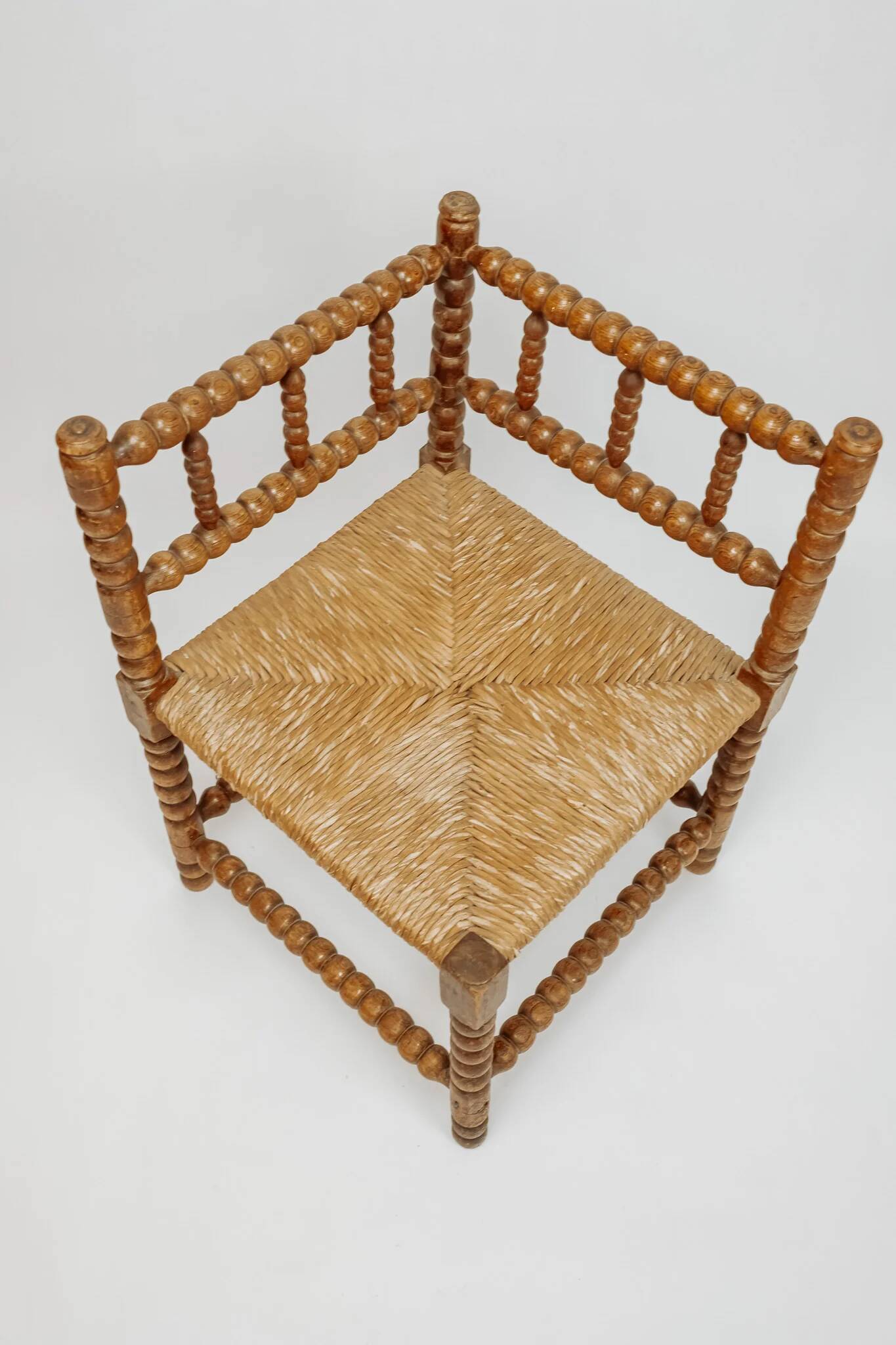 Classic vintage bobbin corner armchair