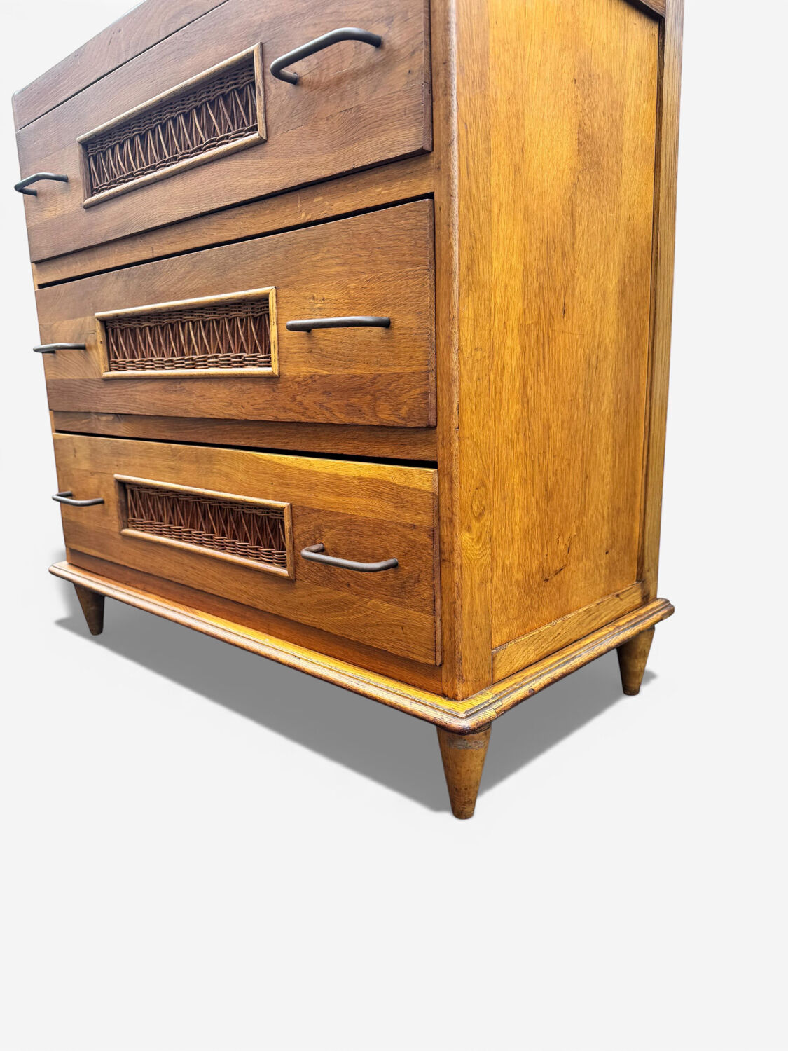 Vintage 1970s chest of drawers: wood and rattan, splayed legs.