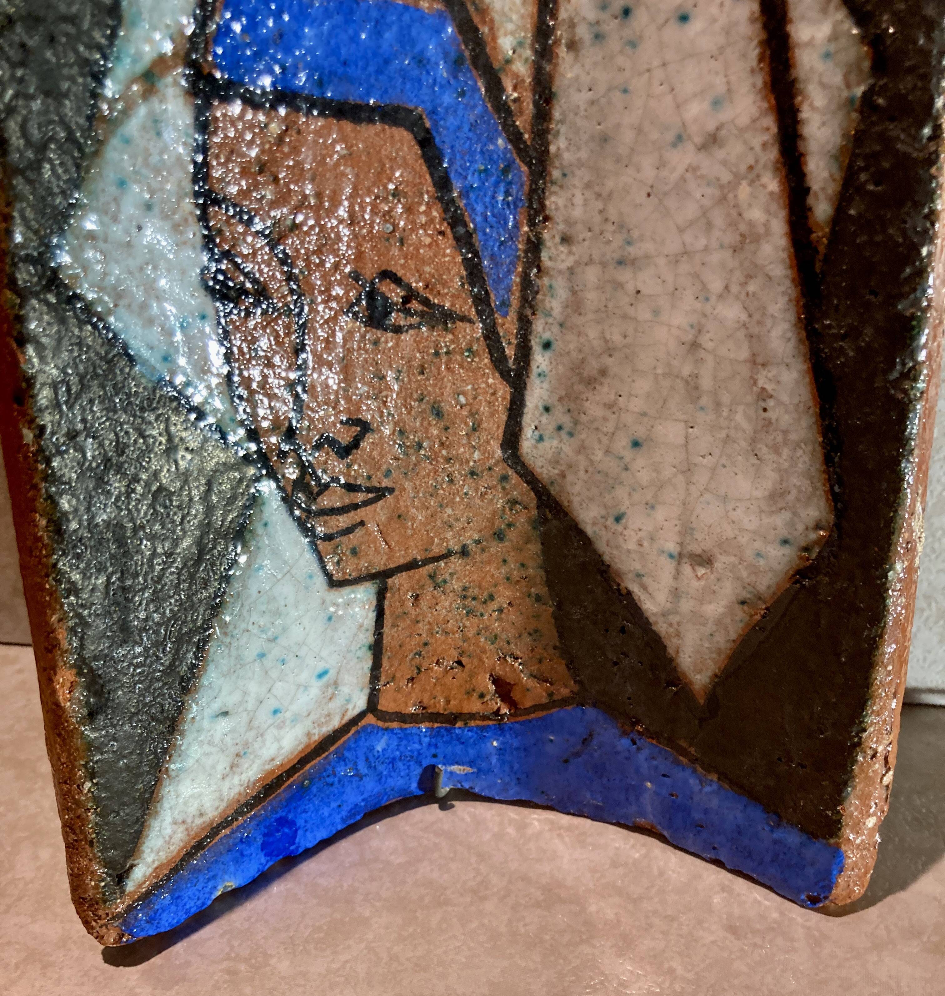 Terracotta tile with enamel decoration of a lady of the high nobility signed OGD