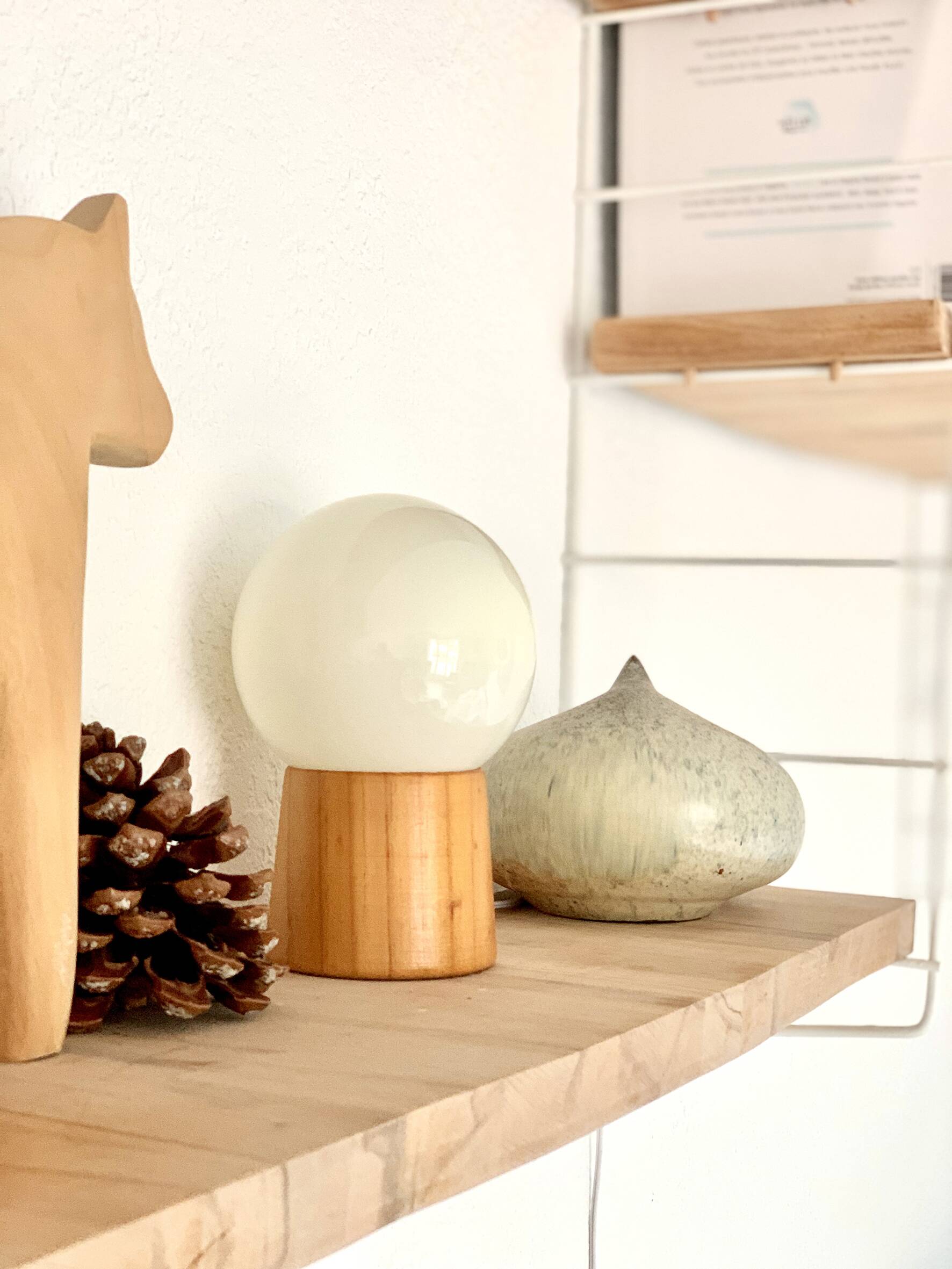 Pair of lamps with wooden base and glass globe, 1970s